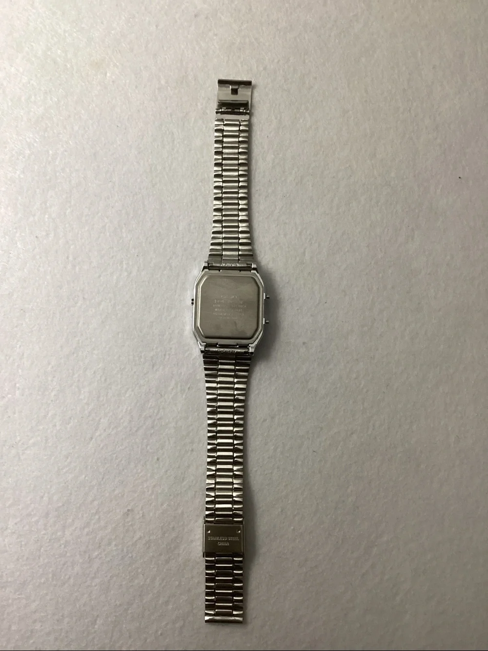Casio Silver Watch with Green Dial and Stainless Bracelet